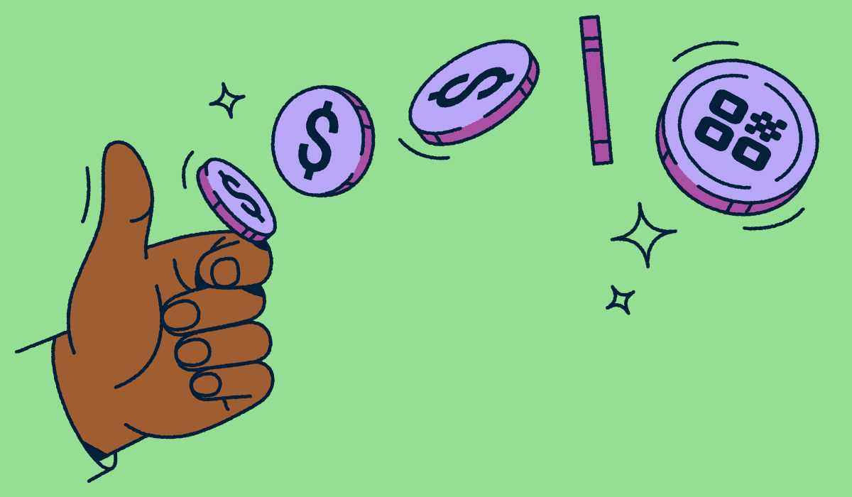 A hand flipping a coin with a QR Code on it.